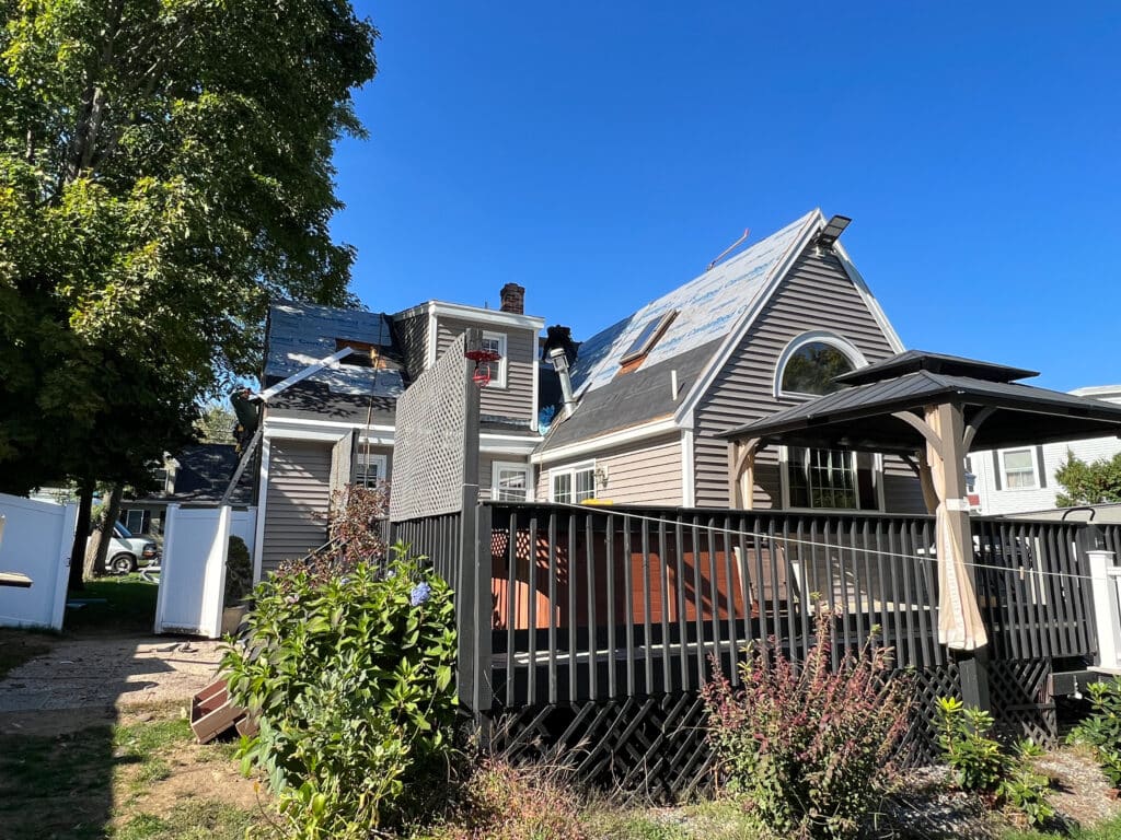 Senco Home Services crew on a completed exterior project in Tewksbury, MA